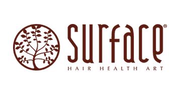 The Surface brand logo featuring a brown circular tree icon next to the word "surface" and the tagline "HAIR HEALTH ART."